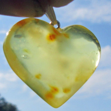 Sonnengelbes Bernsteinherz mit Wolke aus Silber