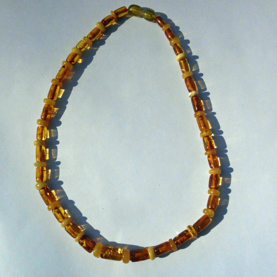 Kognacfarbene Bernsteinkette in Walzenform, Unikat