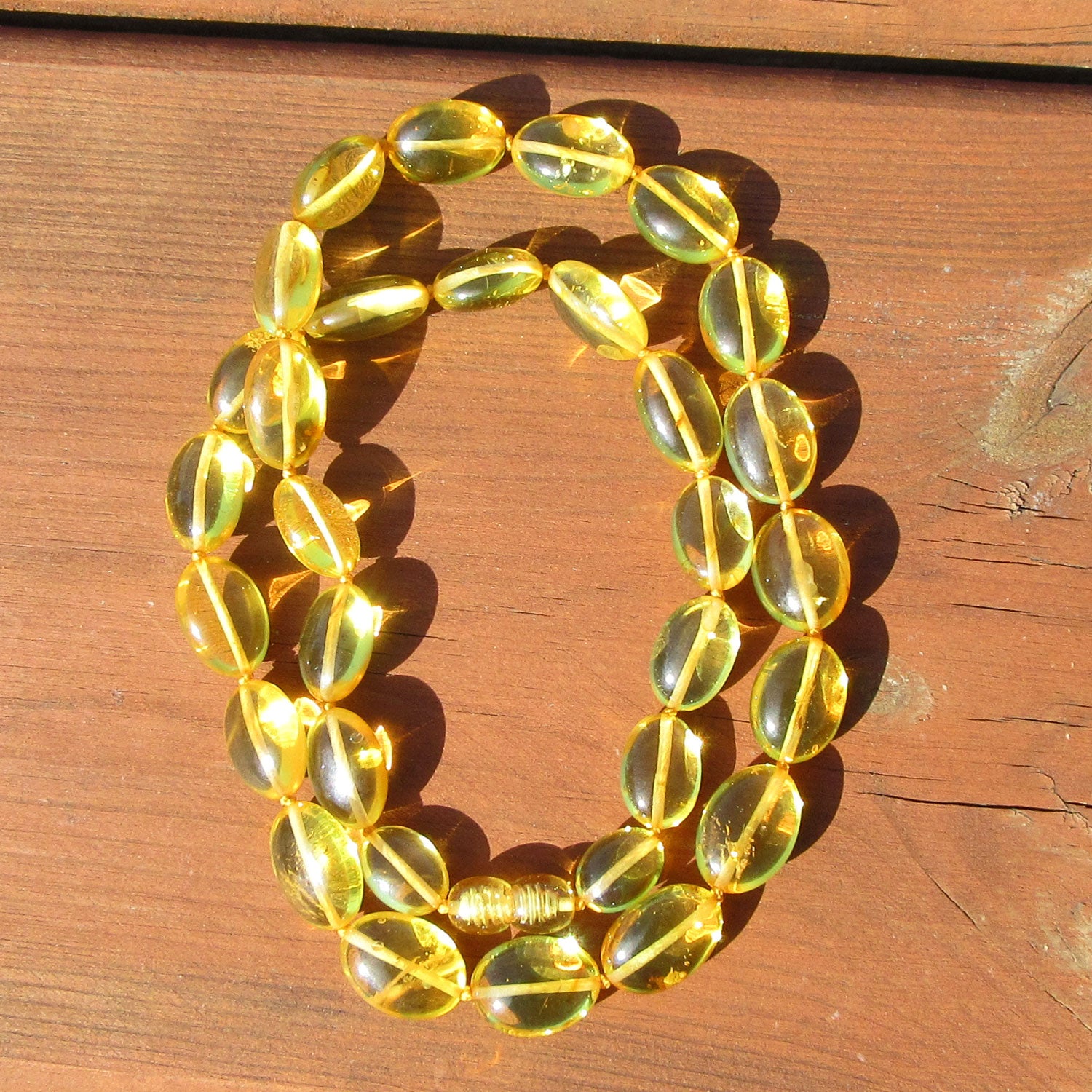 Edle Kette aus goldgelben Bernsteinoliven, Unikat