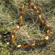 Lange Kette aus verschiedenfarbigen Bernsteinen, Unikat