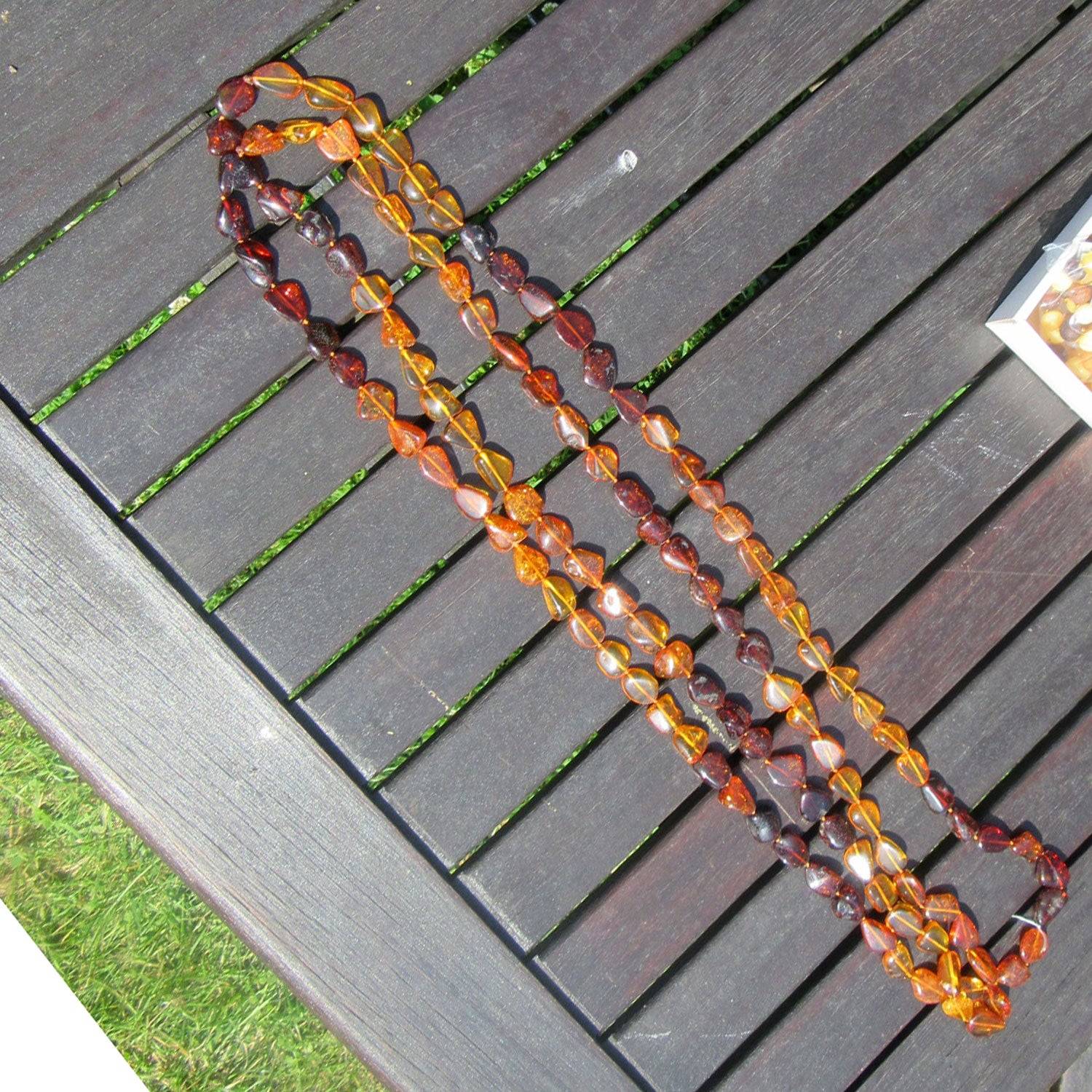 Sehr lange, schicke Kette aus3 verschiedenfarbigen Bernsteinen