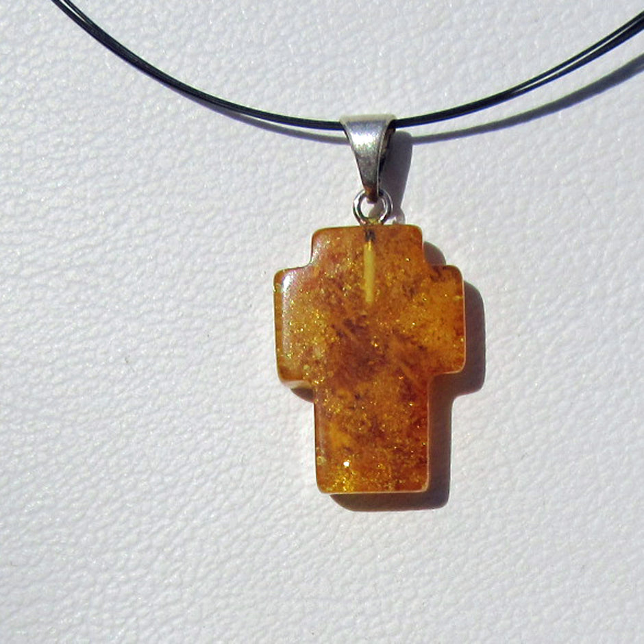 Bernstein Kreuz mit Silberöse, Einzelstück von Rügen