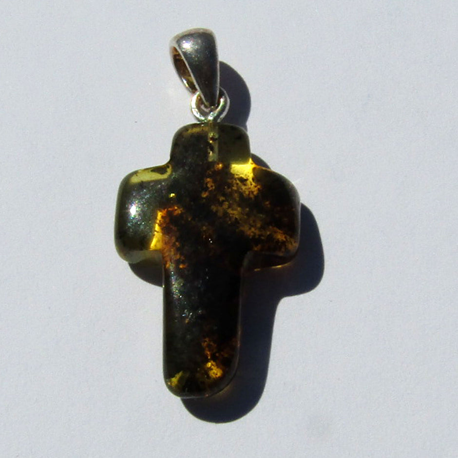 Einzigartiges Kreuz aus klarem Bernstein mit Einschlüssen