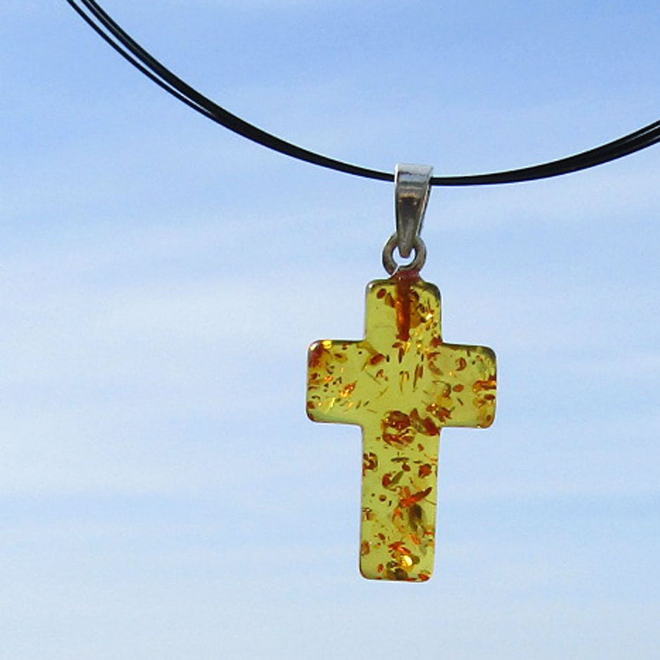 Klares Bernsteinkreuz mit Einschlüssen, Silberöse