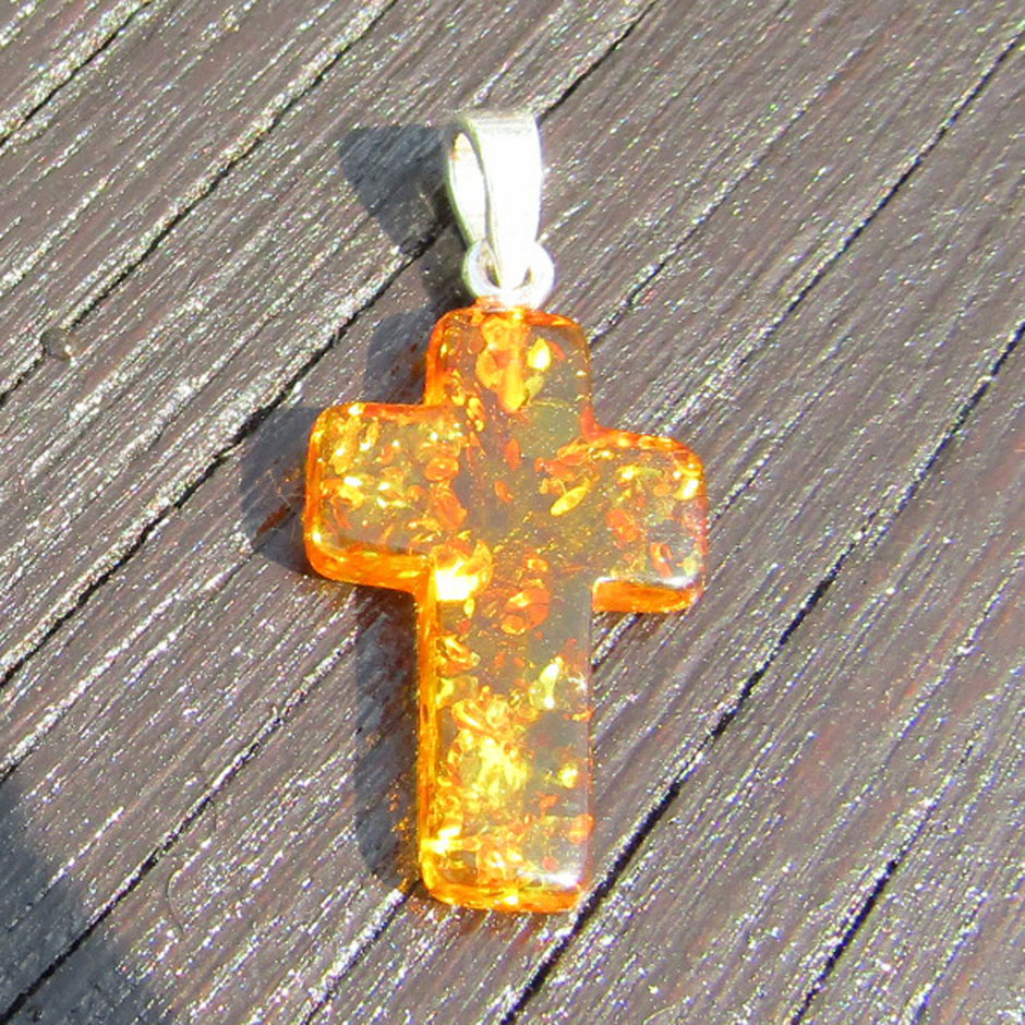 Klares Bernsteinkreuz mit Einschlüssen, Silberöse