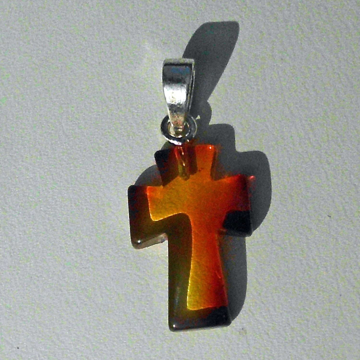 Bernsteinkreuz mit Einschlüssen aus Silber 925, Unikat