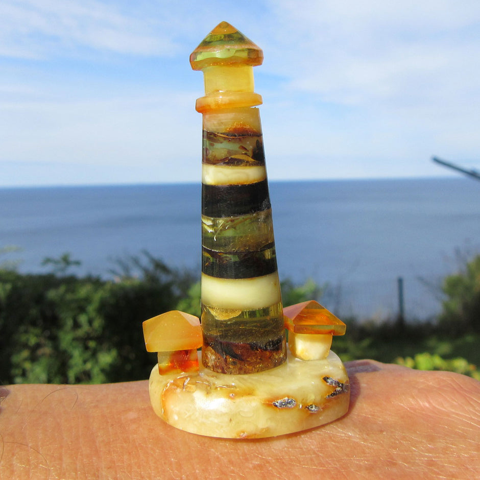 Bernstein-Leuchtturmensemble mit zwei Häusern