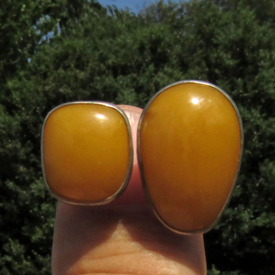 Polierter Butterscotch-Bernsteinring in Silber gefasst