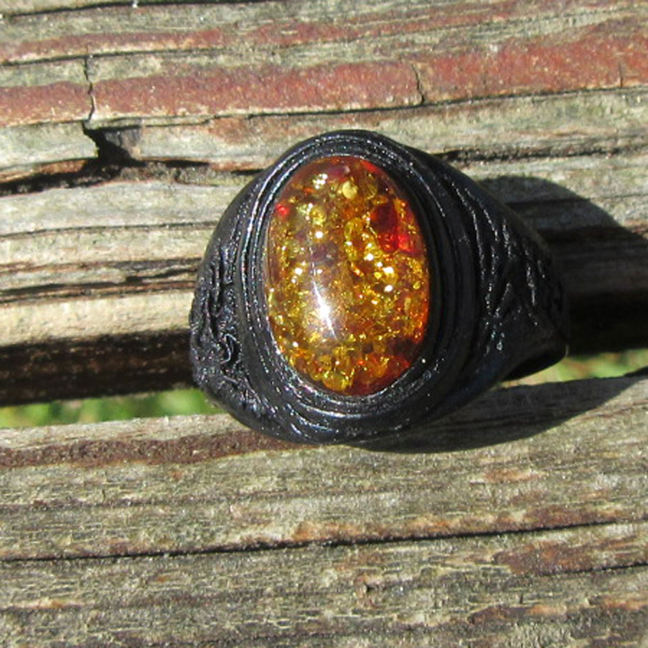 Flexibler Fingerring mit 1 Cabochon aus wunderschönen Bernstein und Leder