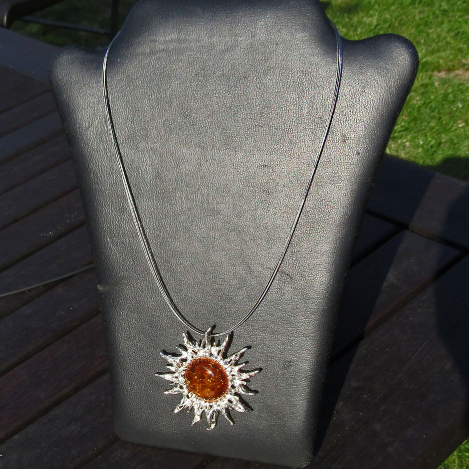 Großer Sonnenschein-Anhänger aus Silber mit Bernstein