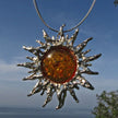Großer Sonnenschein-Anhänger aus Silber mit Bernstein