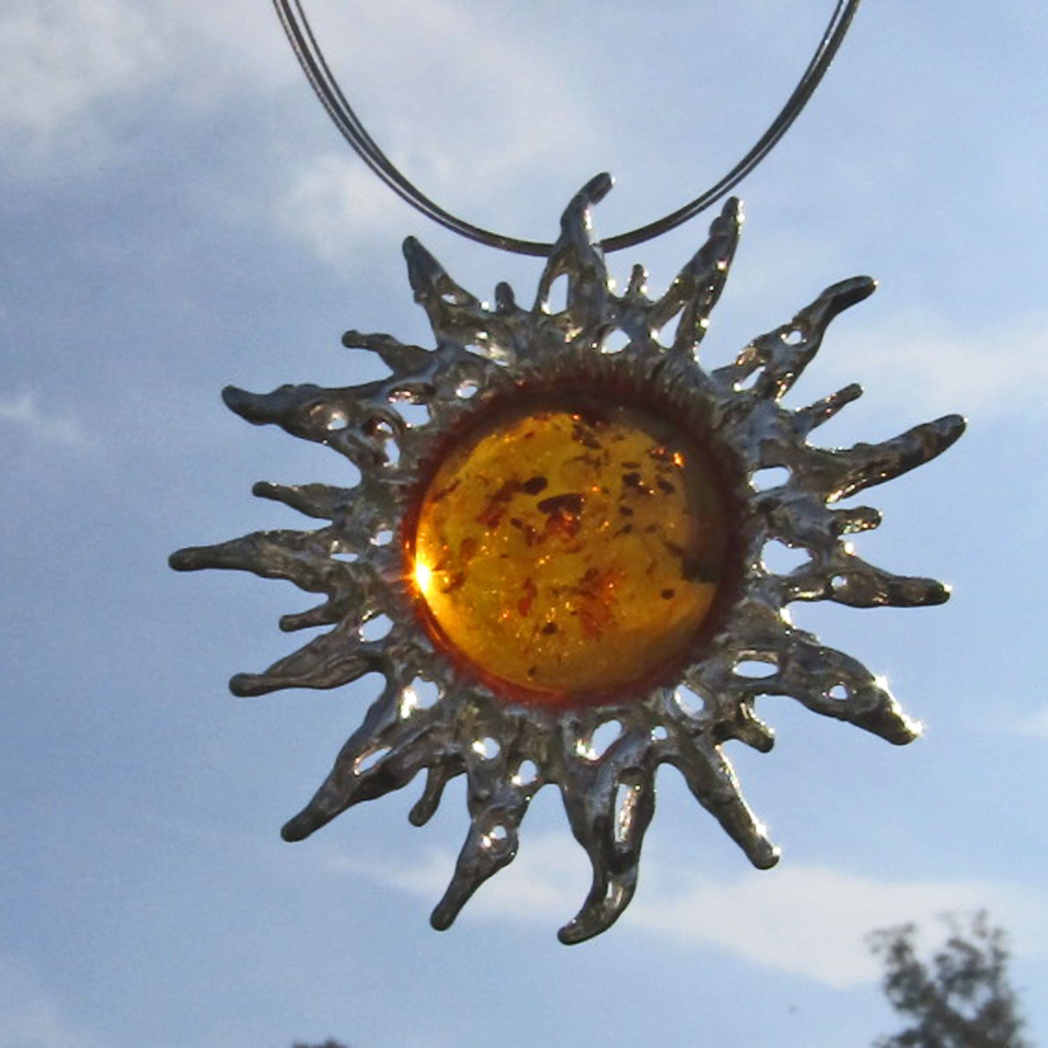 Großer Sonnenschein-Anhänger aus Silber mit Bernstein