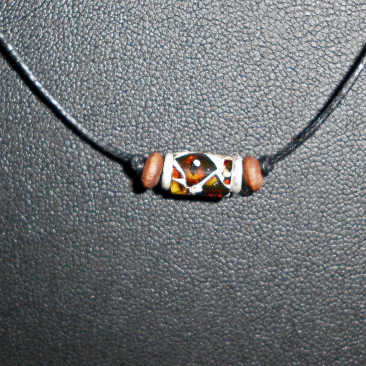 Collier mit Bernsteinwalze und Silberscheiben, Unikat