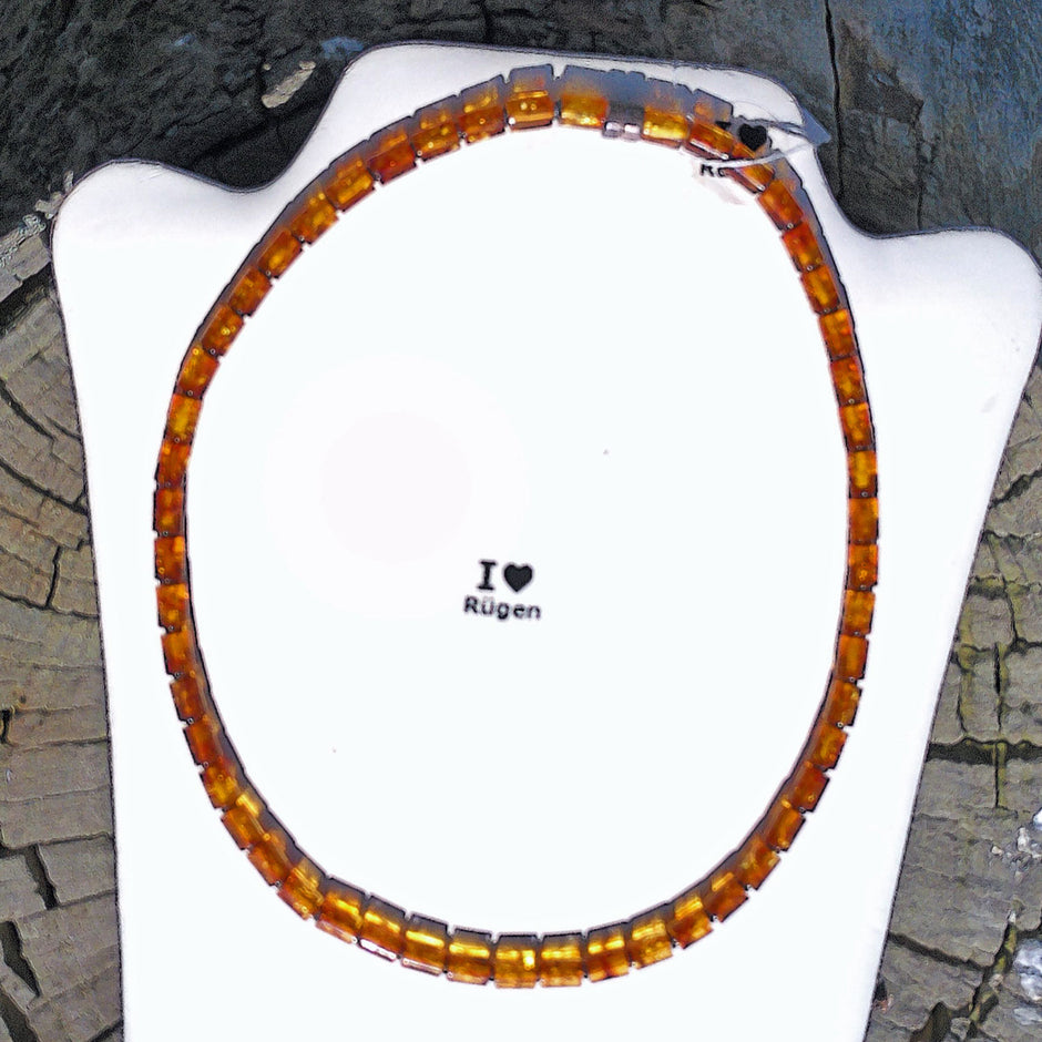 Einzigartiges Collier aus polierten Bernsteinwalzen und Silber