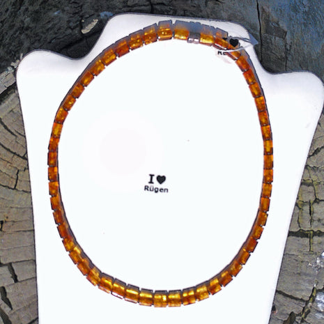 Einzigartiges Collier aus polierten Bernsteinwalzen und Silber