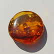 Kognacfarbener Bernsteindonut, poliert, Unikat