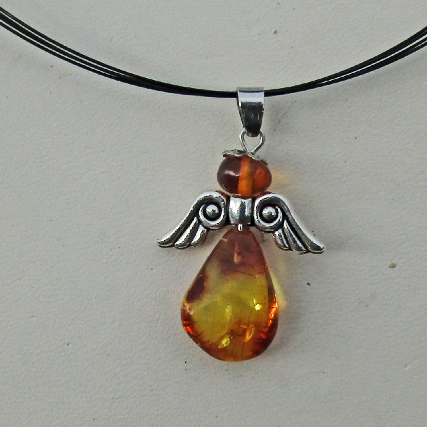 Bernsteinengel als Schutzengel – Unikat von Rügen