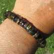 Bernsteinarmband aus dunklen, polierten Bernsteinscheiben