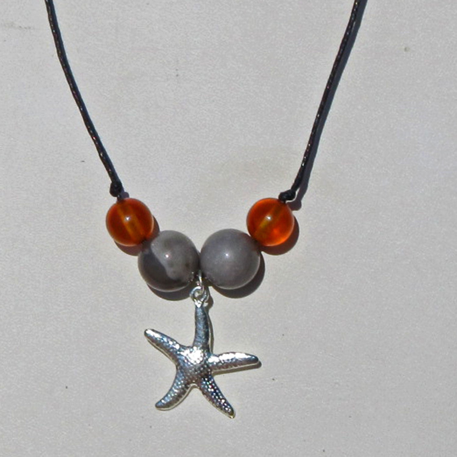 Collier mit Feuerstein, Bernstein und Silber-Seestern