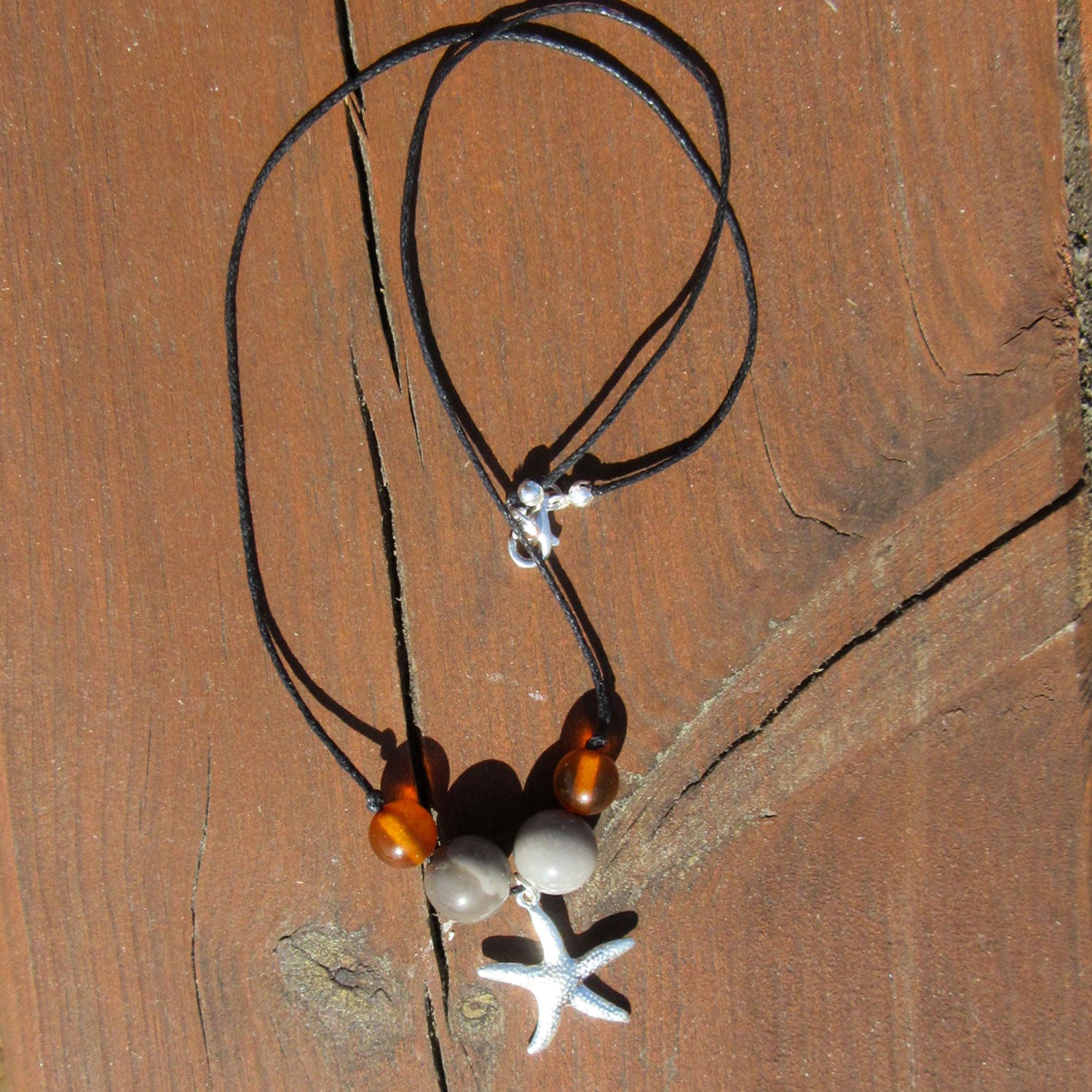 Collier mit Feuerstein, Bernstein und Silber-Seestern