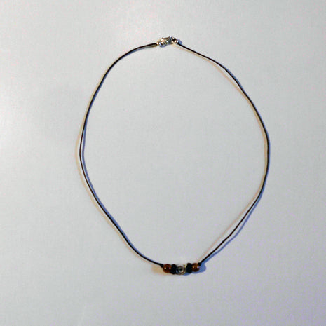 Bernsteincollier mit silberner Spirale und Holzperle