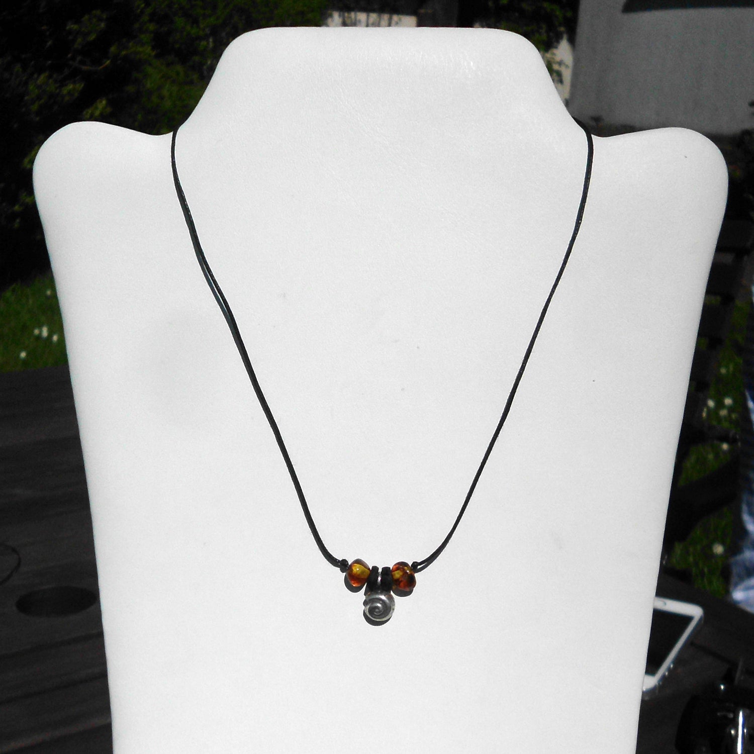 Collier aus Bernstein und Silber mit Schnecke, Unikat