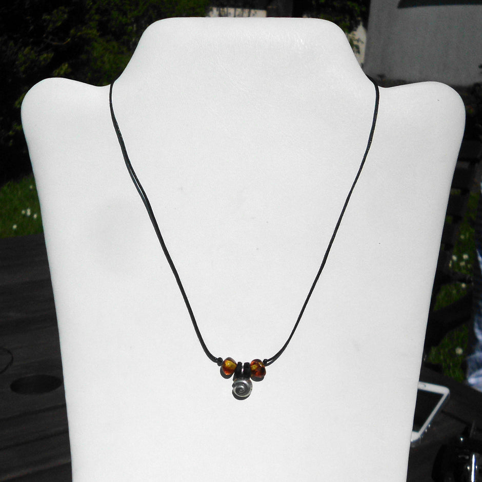 Collier aus Bernstein und Silber mit Schnecke, Unikat