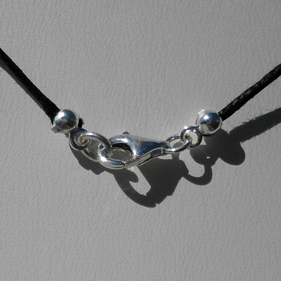 Schickes Donnerkeilcollier mitSilberröhrchen- und scheiben