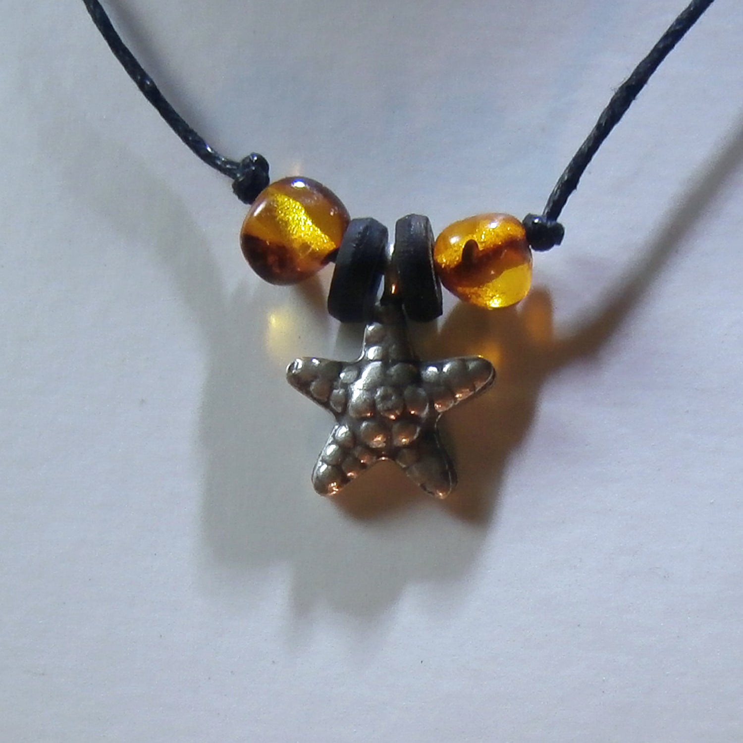 Collier aus Bernstein und Seestern aus Silber, Unikat