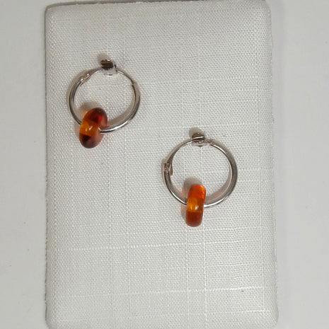 Elegante Creolen mit bernsteinfarbenen Scheiben