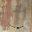Elegantes Drahtcollier mit Bernstein und Silberröhrchen