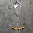 Drahtcollier aus Bernstein und Silberperlen, 44 cm