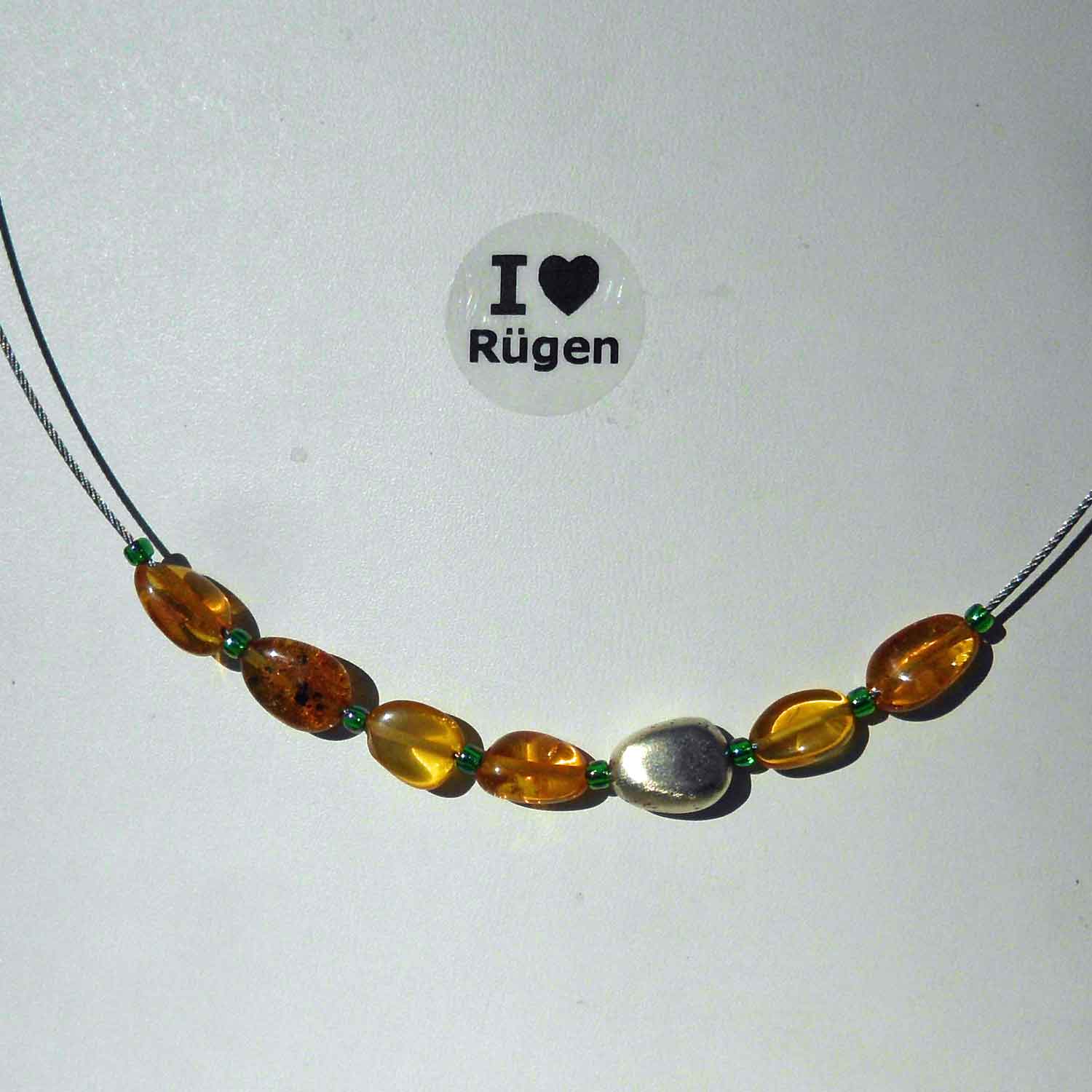 Feines Collier aus Bernstein und Silberolive, Unikat