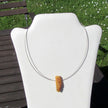 Drahtcollier aus Silber mit unpoliertem Bernstein