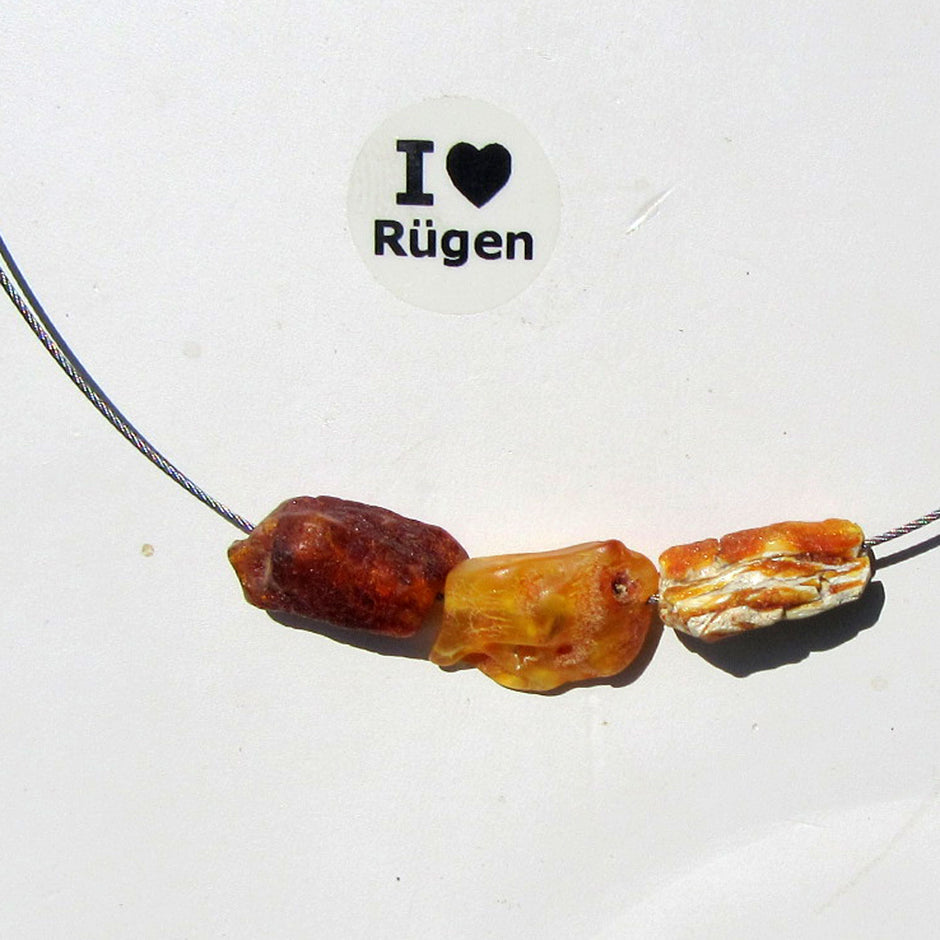 Drahtcollier mit 3 unpolierten Bernsteinen, Unikat