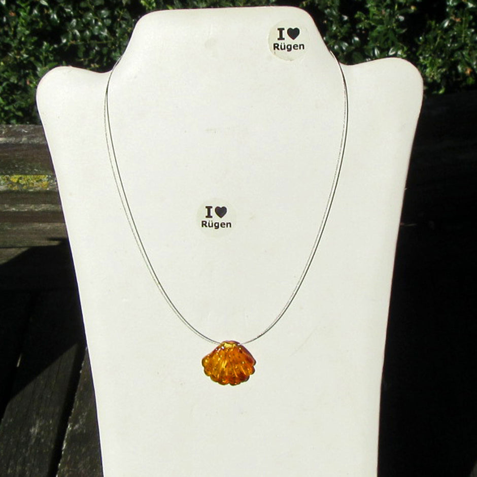 Elegantes Drahtcollier mit polierter Bernsteinmuschel