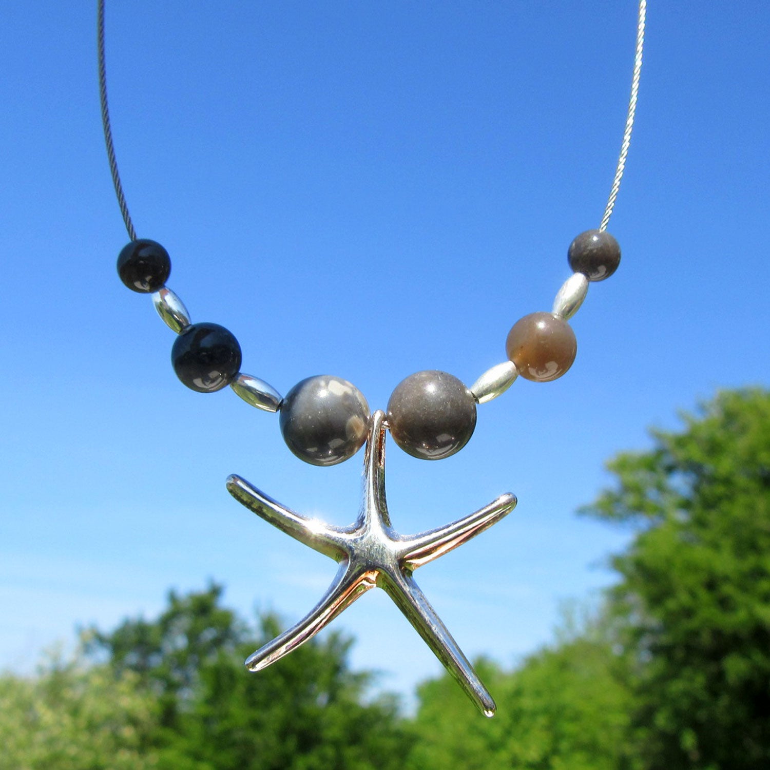 Edles Collier aus Feuerstein und Silber mit Seestern