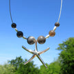 Edles Collier aus Feuerstein und Silber mit Seestern
