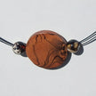 Collier mit Bernstein und Holzscheibe, maritim und einzigartig