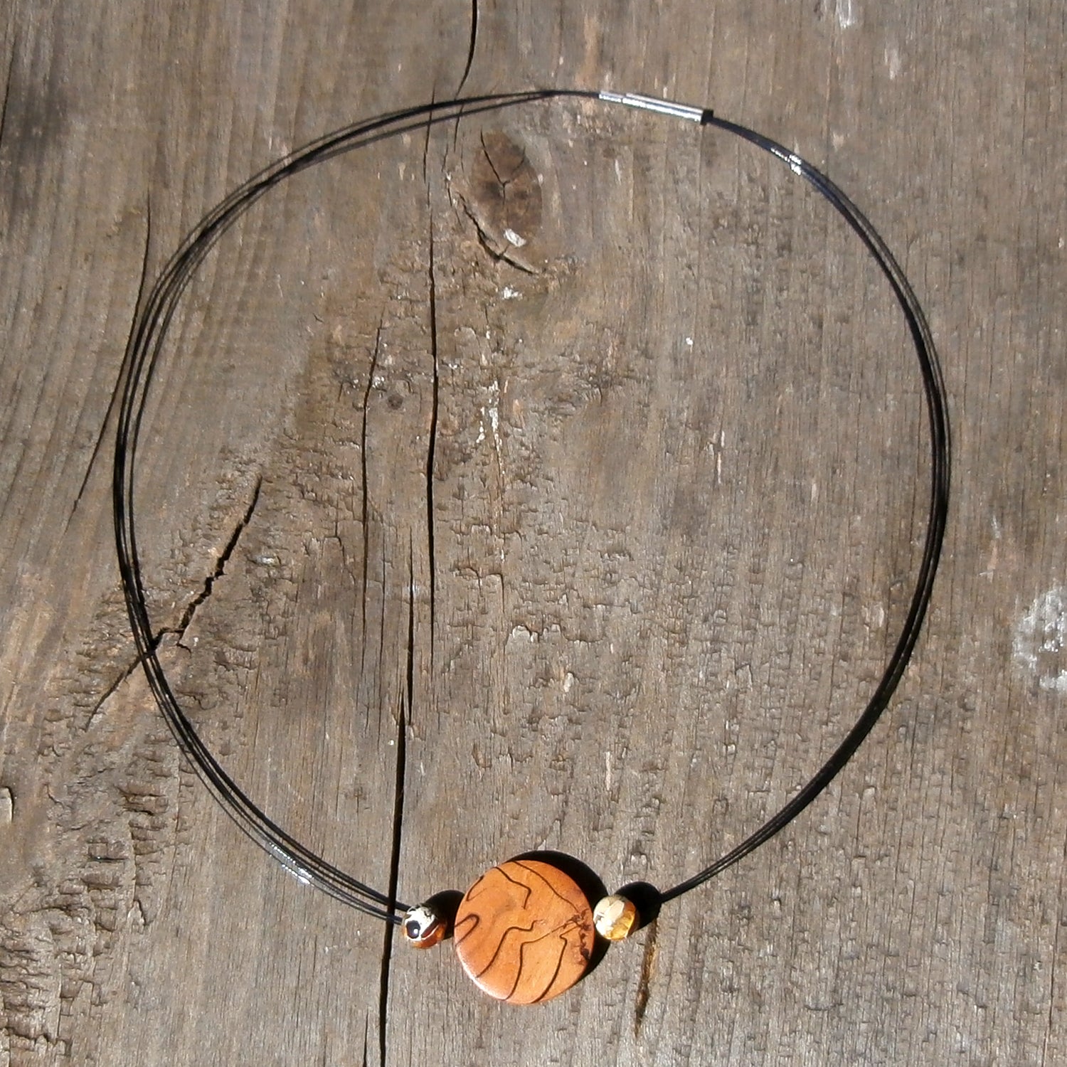 Collier mit Bernstein und Holzscheibe, maritim und einzigartig