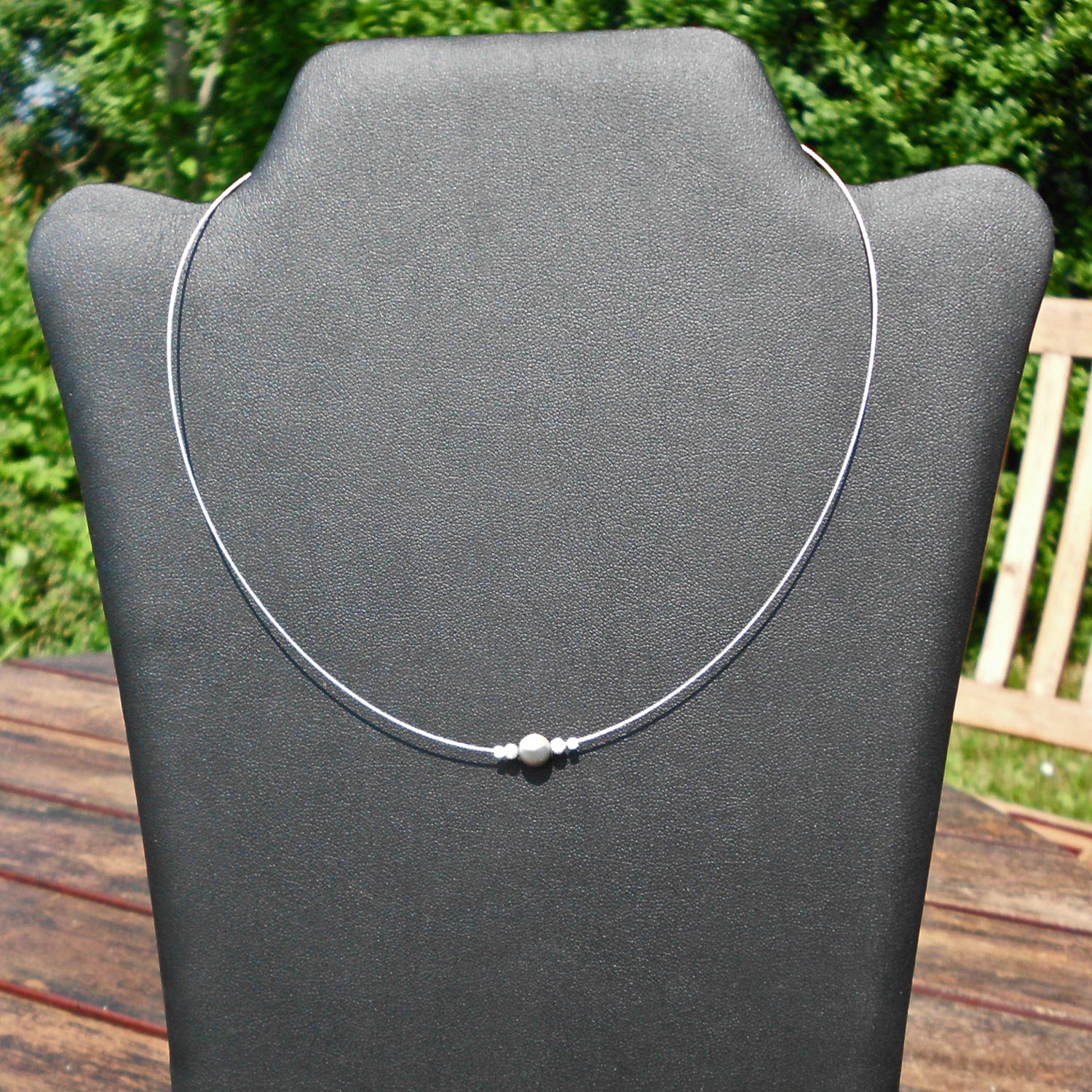 Feuersteinperle mit Silberkugeln, 42 cm lang