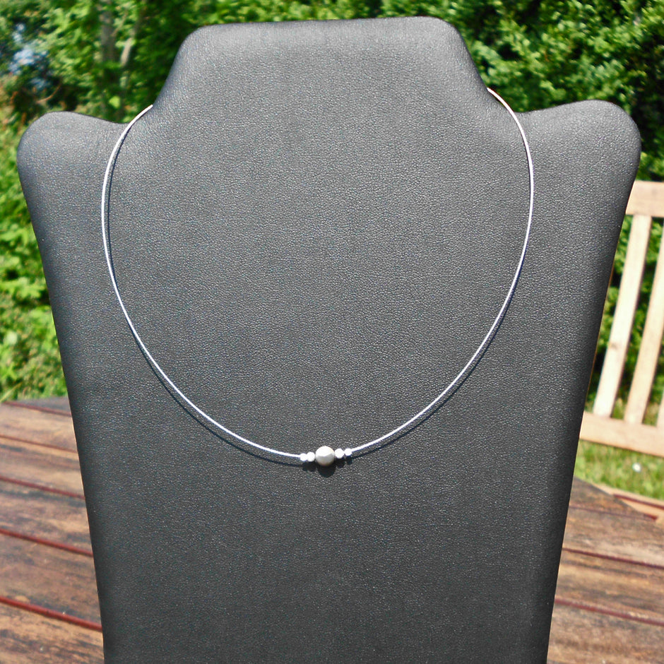 Feuersteinperle mit Silberkugeln, 42 cm lang