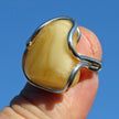 Dreieckiger Bernsteinring in Silber, butterscotch Unikat