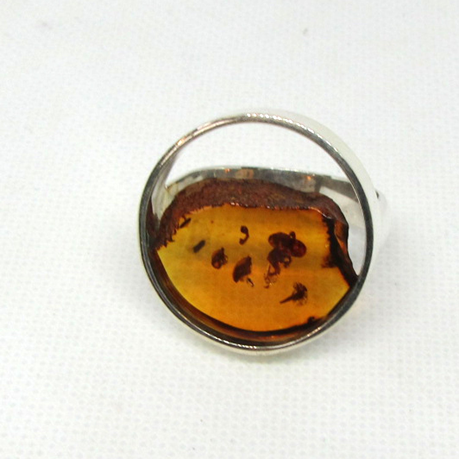 Edler Fingerring aus Silber und Bernstein mit Einschlüssen