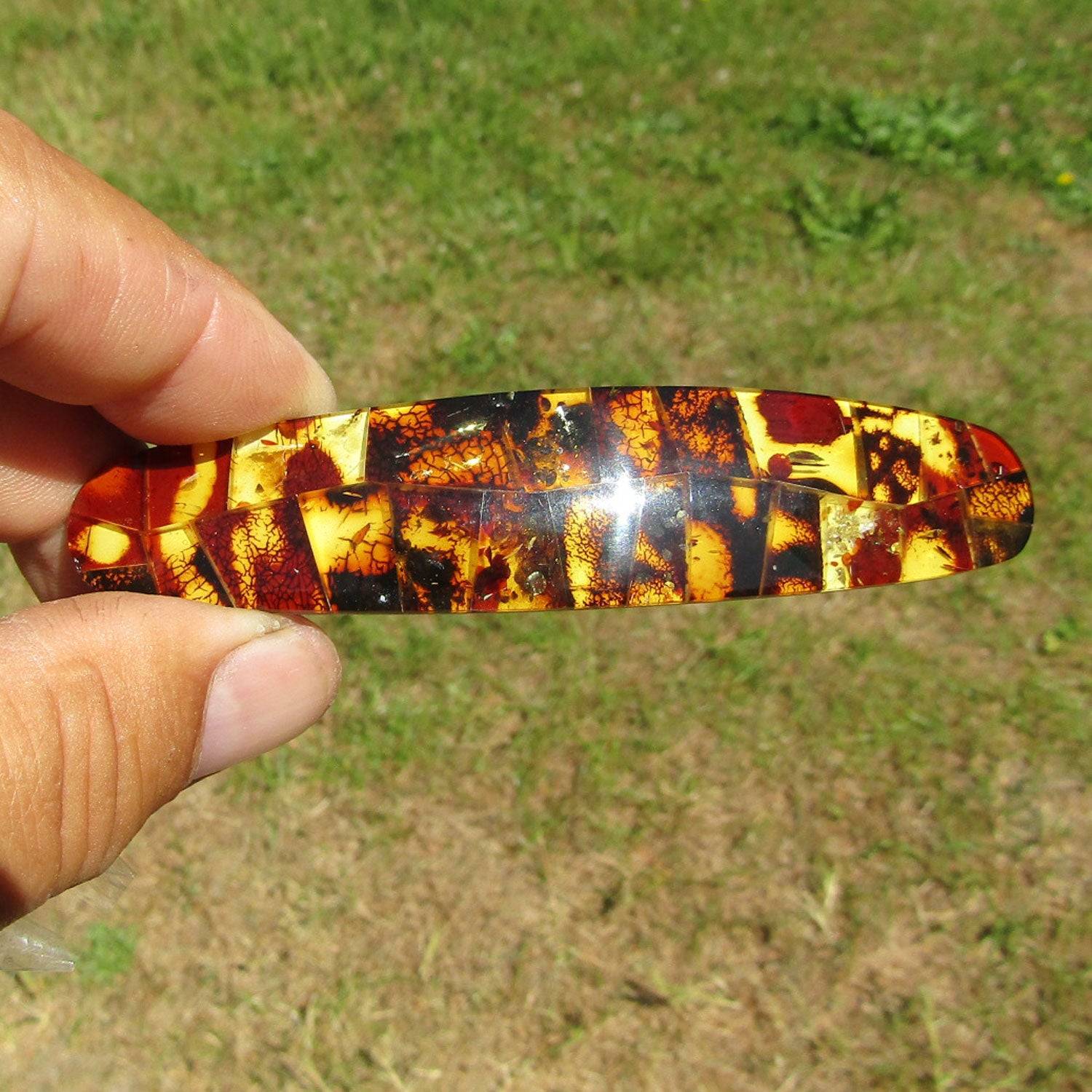 Einzigartige Haarspange aus buntem Bernstein