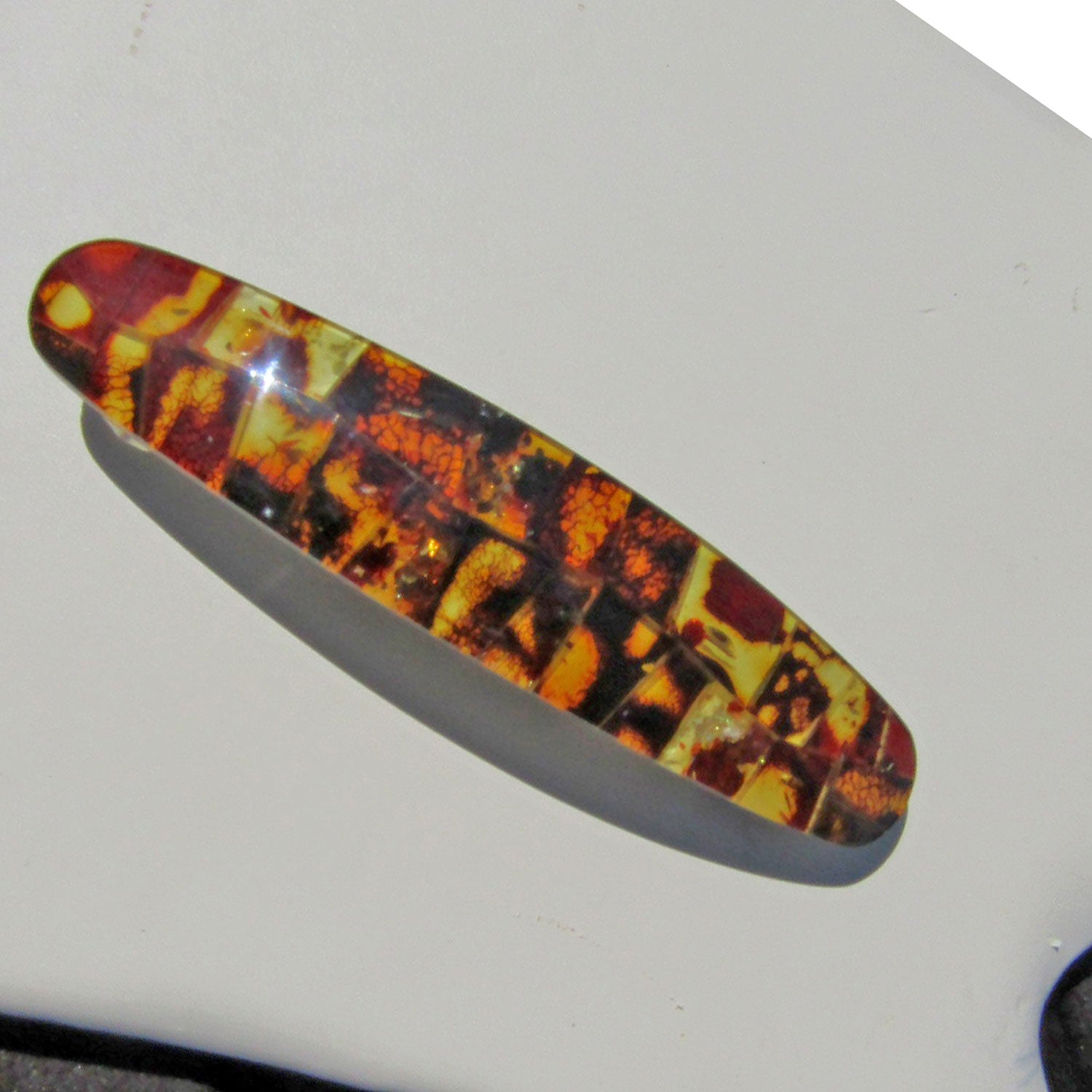 Einzigartige Haarspange aus buntem Bernstein