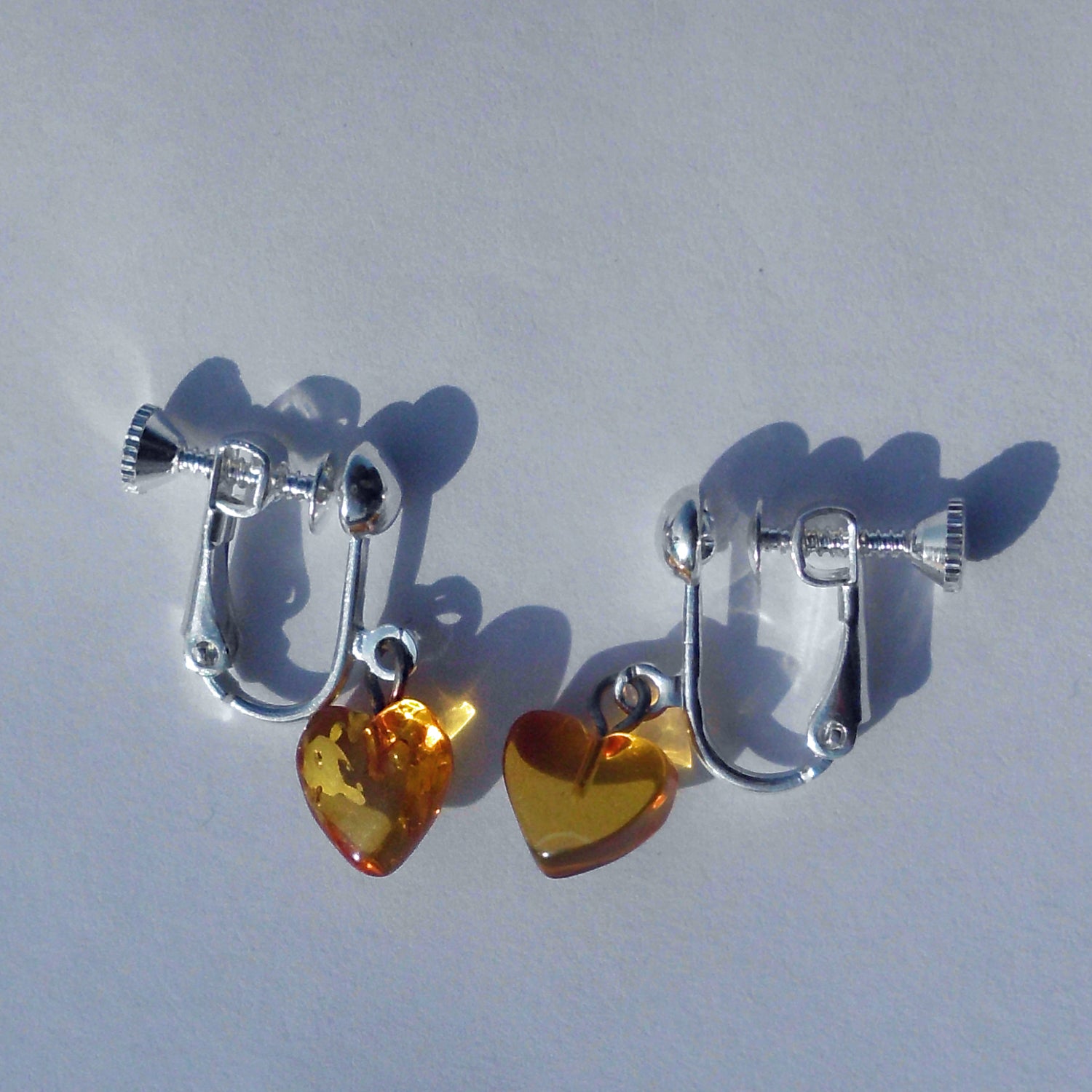 Klappbrissur mit Herzen aus Bernstein, maritim und individuell