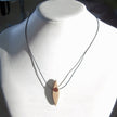 Collier mit 3 Bernsteinen und rautenförmigem Holz