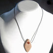 Collier aus Bernstein und Holz mit rautenförmigem Anhänger