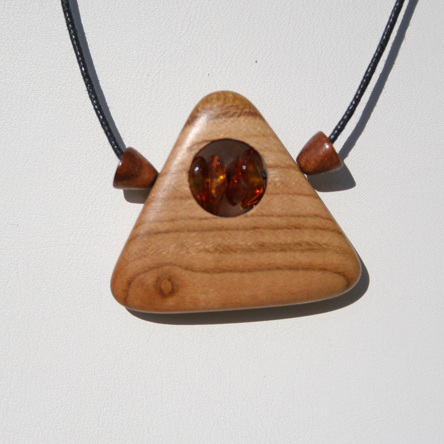 Einzigartiger Ring aus Bernstein und Holz von Rügen